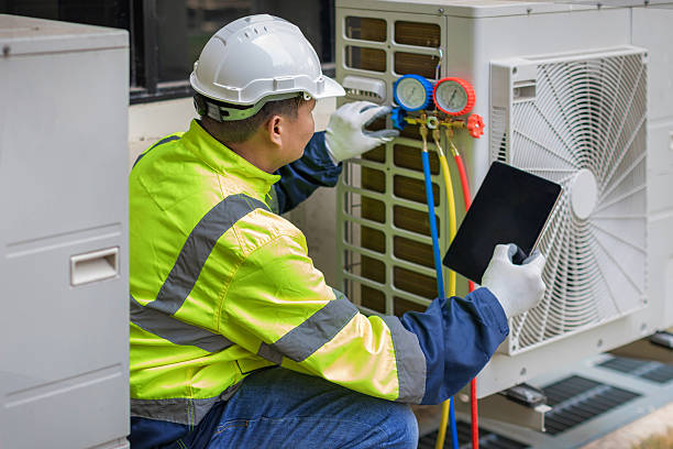 Professional Air Conditioning Repair technician working in Victor, CO